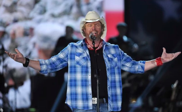 On April 7, 2014, Toby Keith is seen playing in Las Vegas at ACM Presents an All-Star Salute to the Troops.