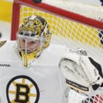 On Monday, May 6, 2024, in Sunrise, Florida, goalkeeper Jeremy Swayman (1) of the Boston Bruins deflects a shot during the second period of Game 1 of the Stanley Cup Playoffs second-round series against the Florida Panthers.