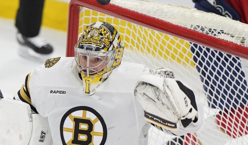 On Monday, May 6, 2024, in Sunrise, Florida, goalkeeper Jeremy Swayman (1) of the Boston Bruins deflects a shot during the second period of Game 1 of the Stanley Cup Playoffs second-round series against the Florida Panthers.